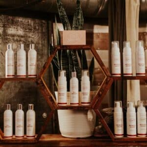 Wall of tanning mousse at OATS SLO tanning & airbrush salon