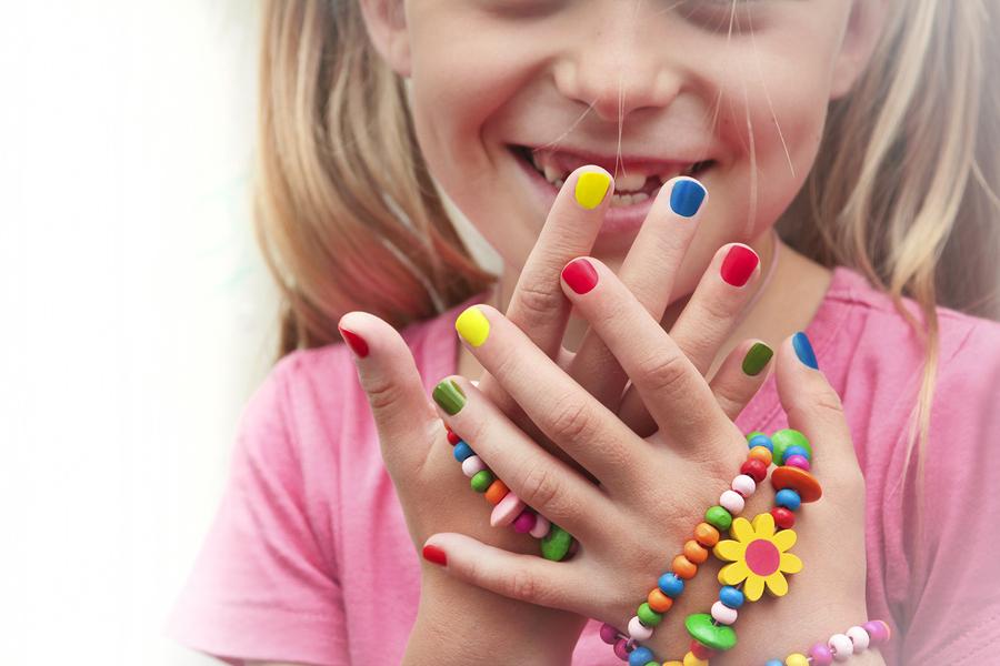 Child with painted nails